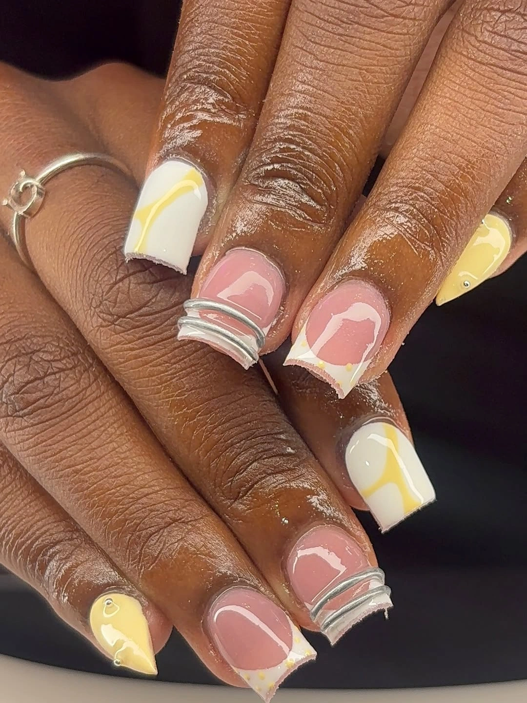 long square nails with pastel multicolor French tips