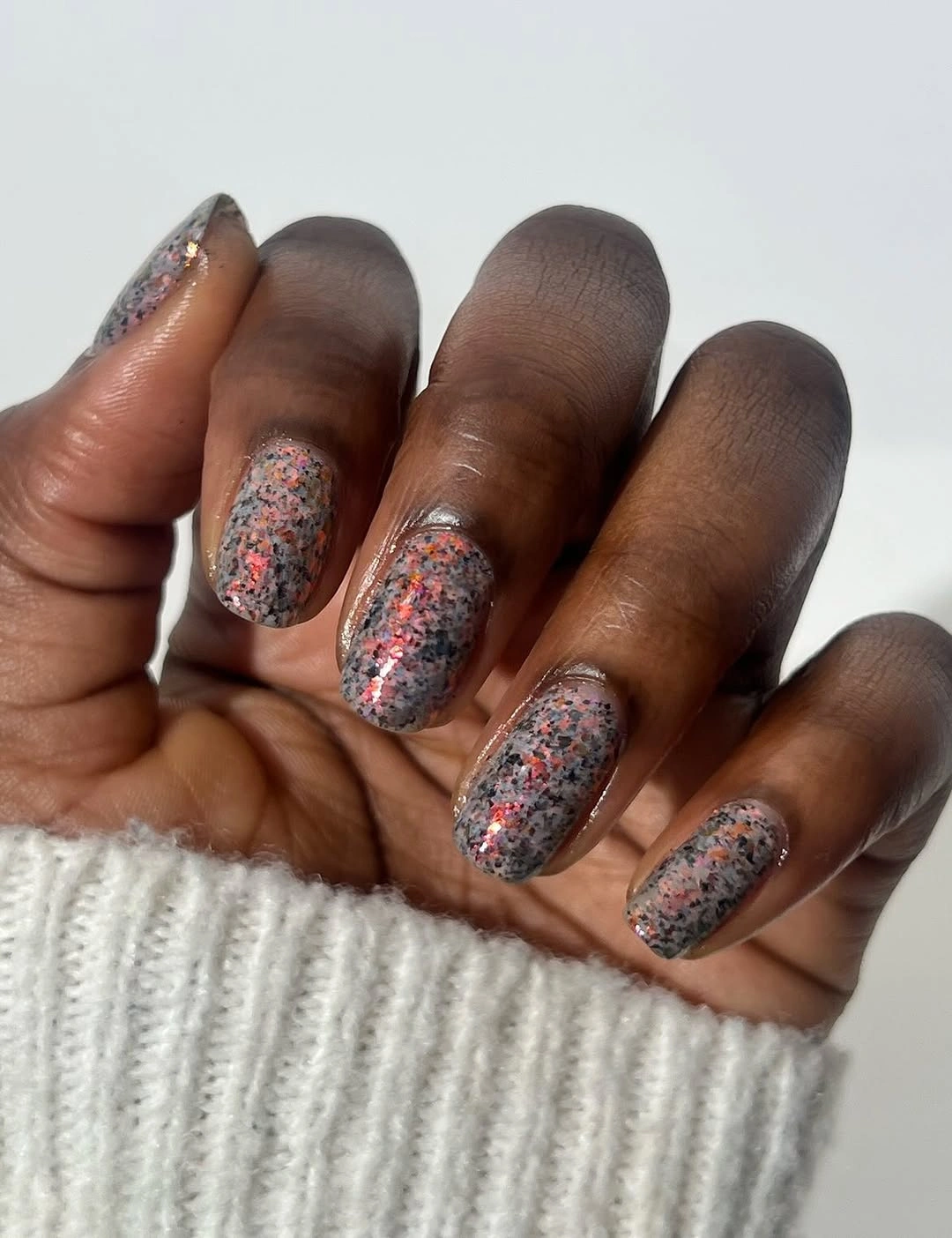 short square nails with dense multicolor glitter