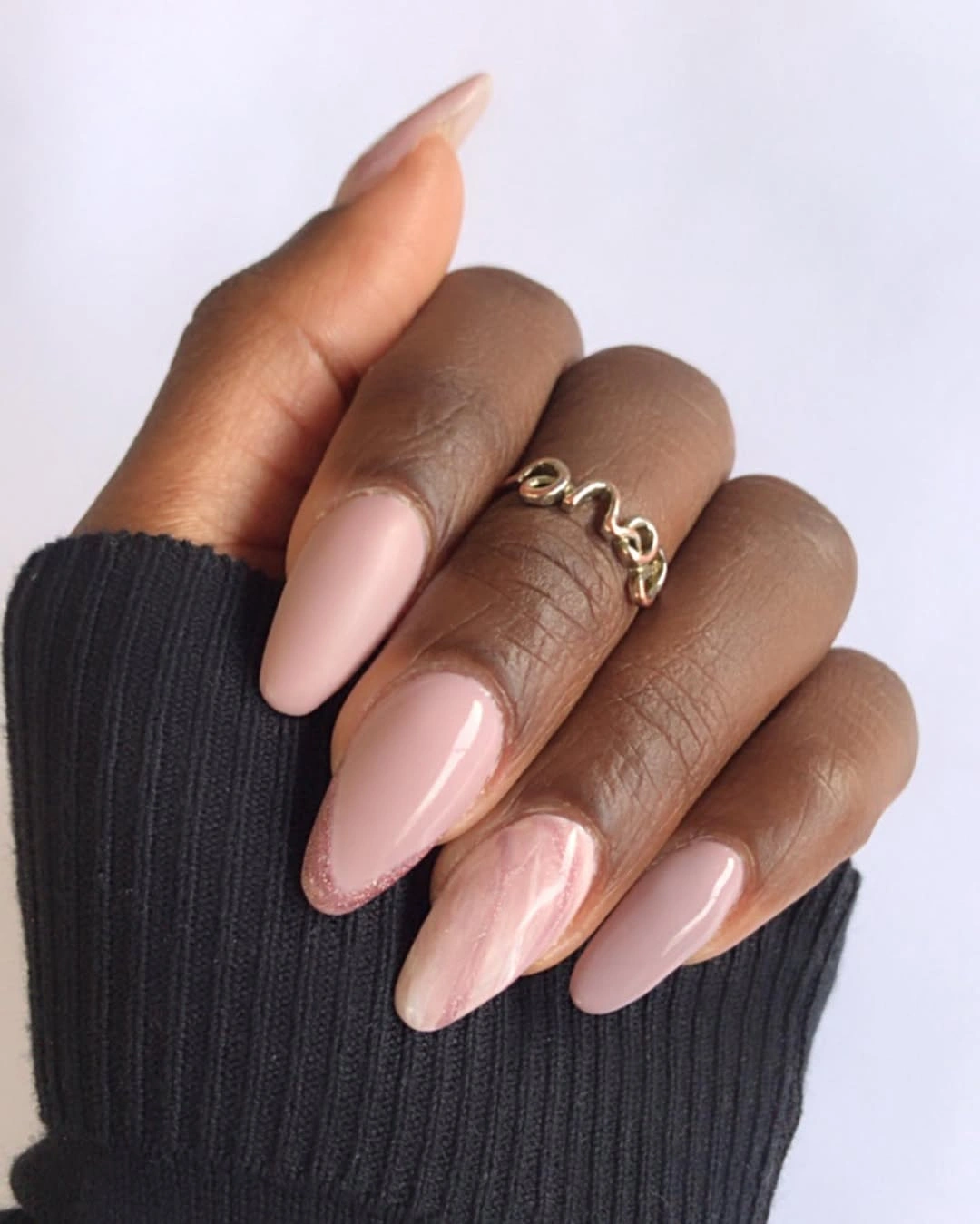 long almond nails in a glossy blush pink