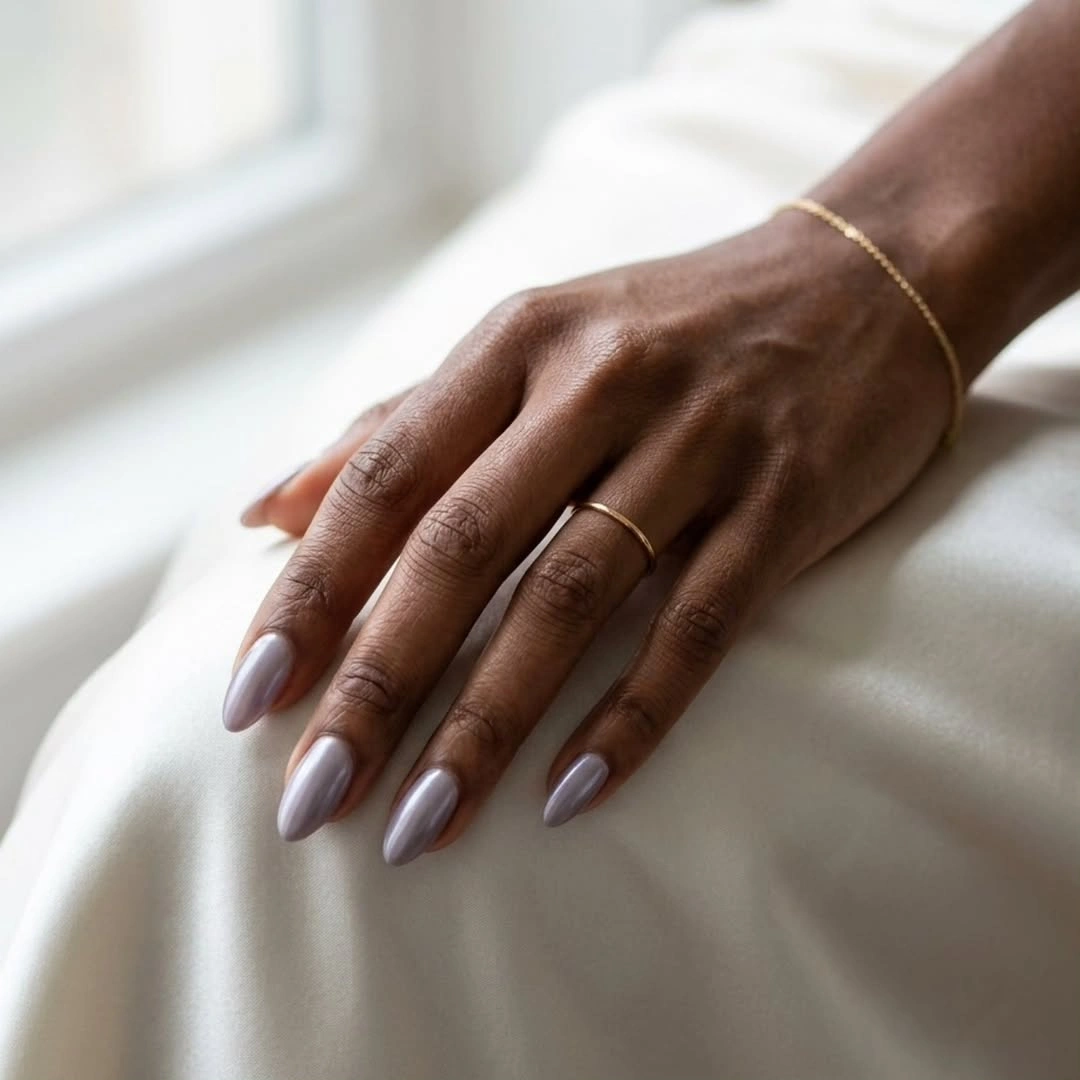 Medium almond sheer nude nails with delicate white swirl details