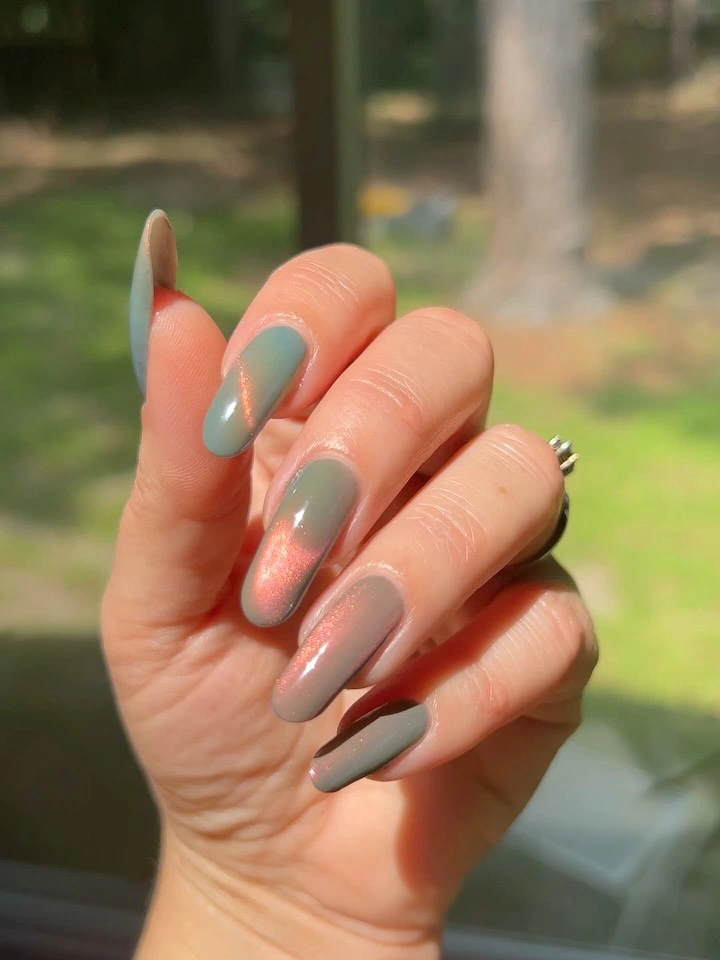 Long almond nails in muted sage greige pink and pearly neutrals