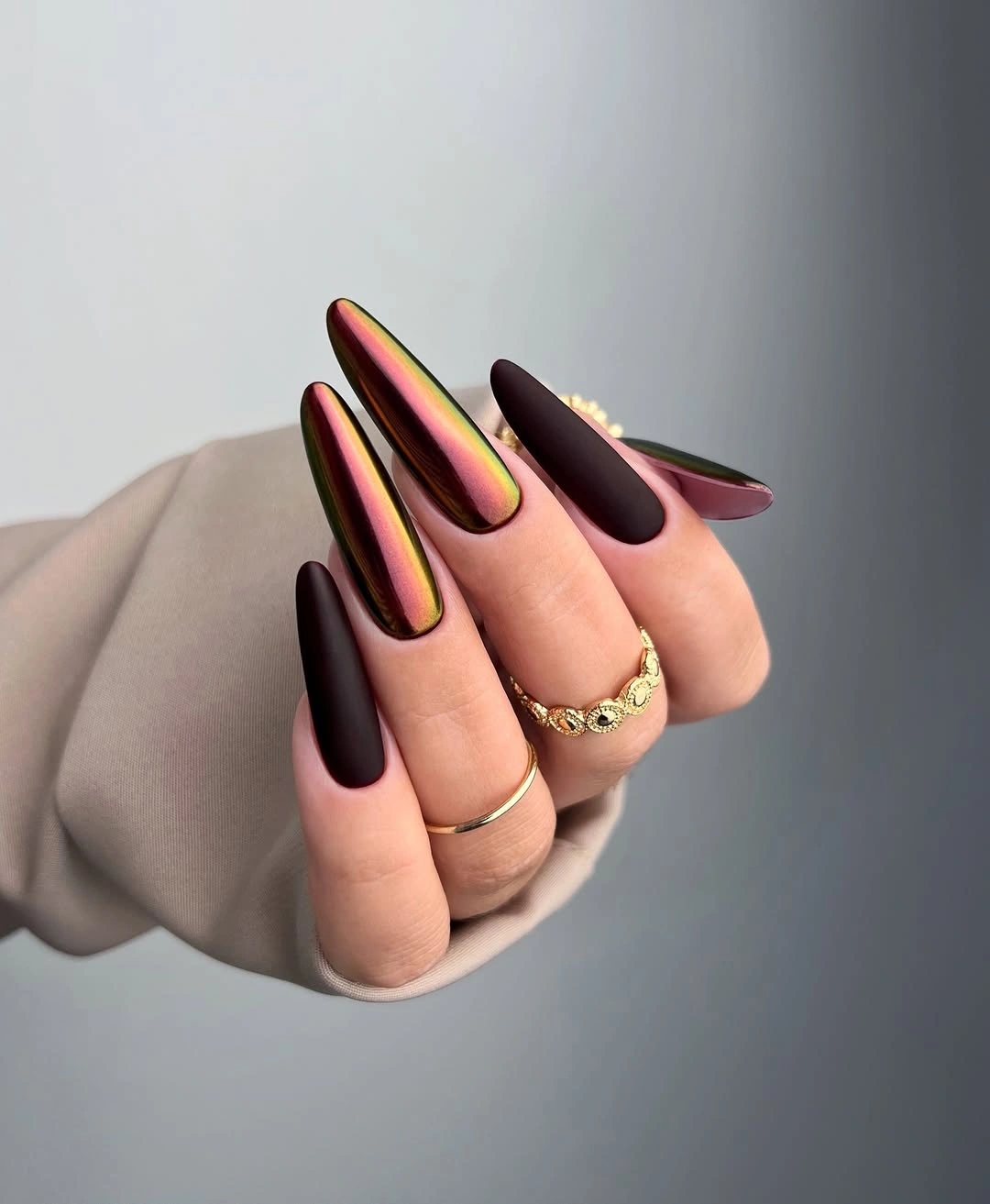 Long black velvet and iridescent chrome stiletto nails