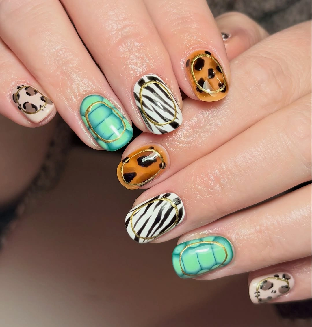 Short square teal zebra and animal print nails