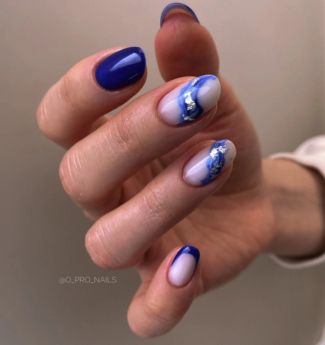Short square cobalt and pearly blue nails with white line art