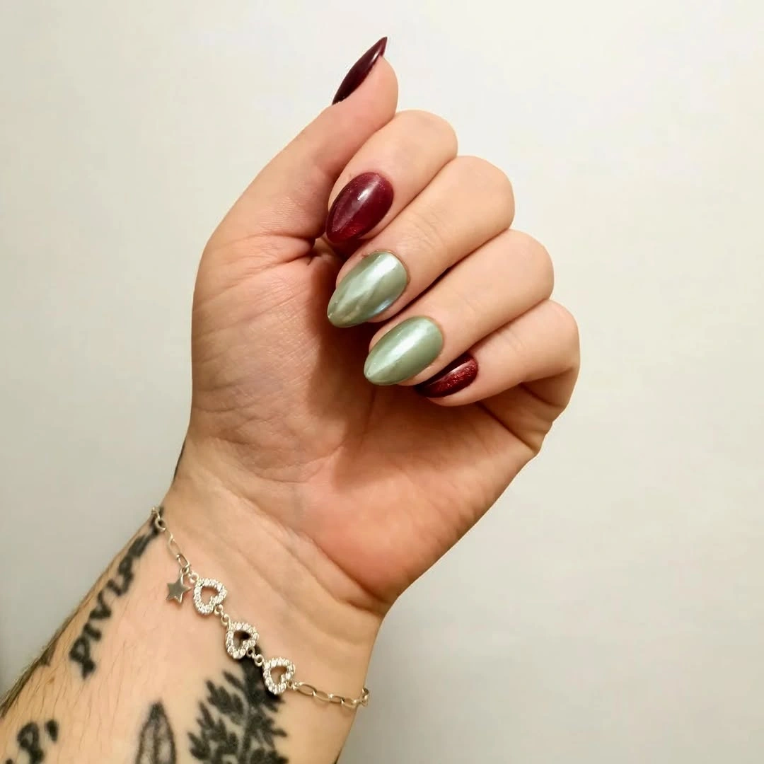 Long almond nails alternating wine red and muted green solids
