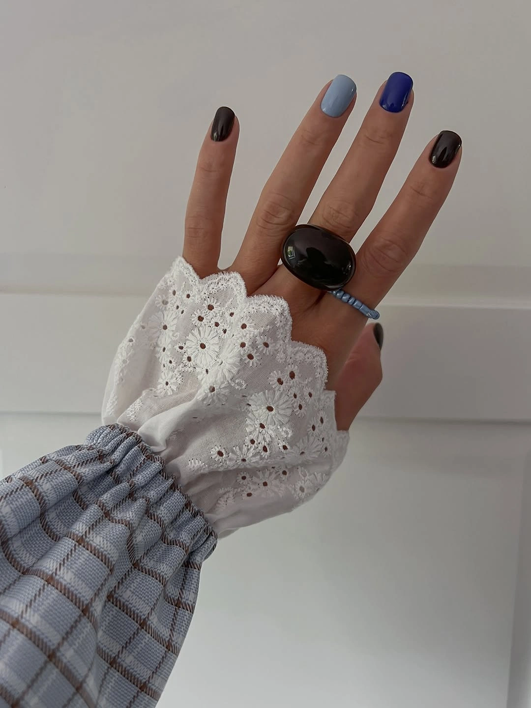 Short nails in charcoal gray blue and cobalt solid colors