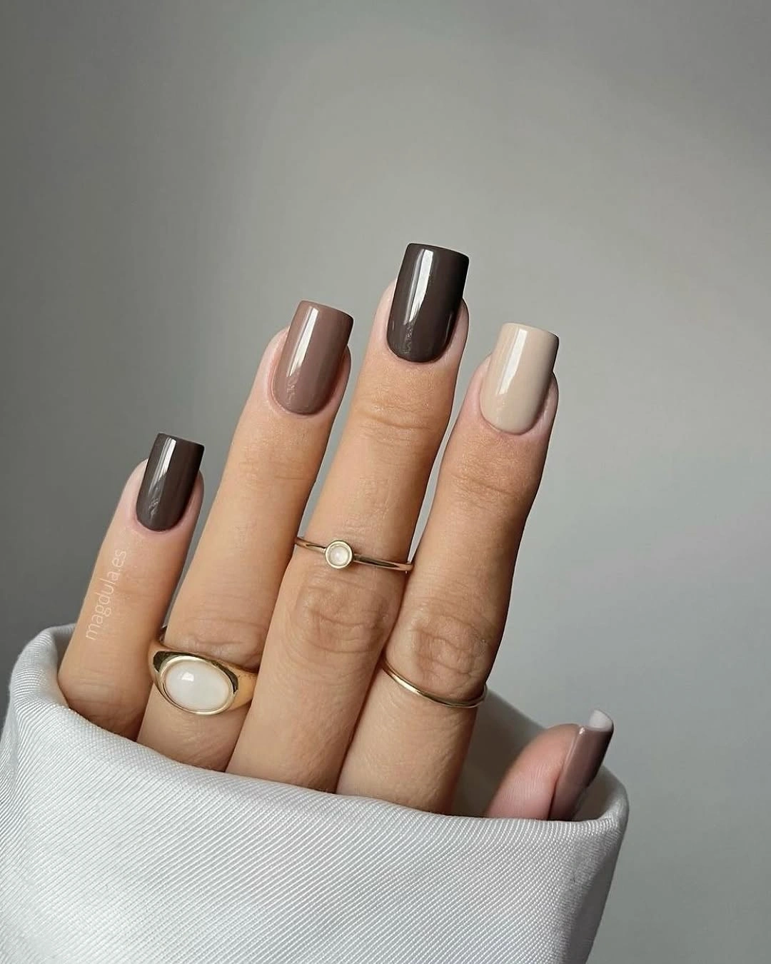 Short square nails in taupe brown and cream glossy solids