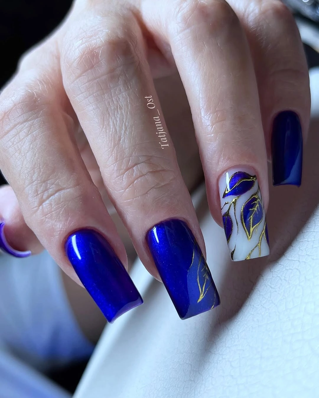 Long cobalt square nails with white blue and gold line accent