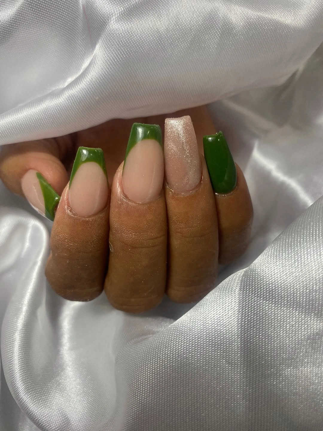 Medium coffin nails with green tips one solid green nail and glitter