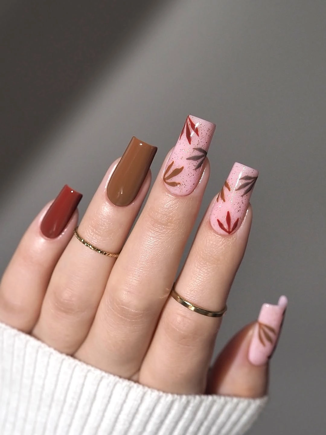 pink almond nails with botanical French lines