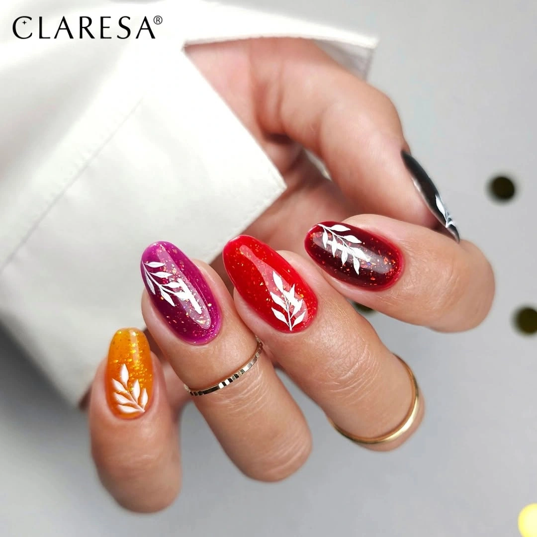 glossy multicolor almond nails with leaf lines