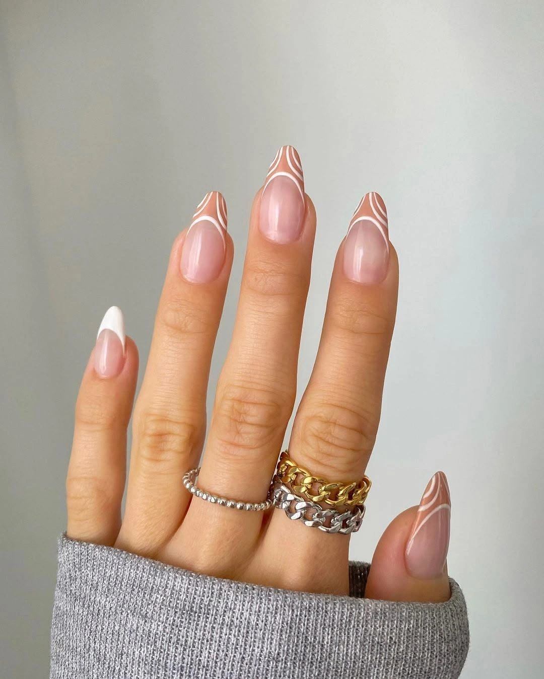 nude almond nails with white coral tips