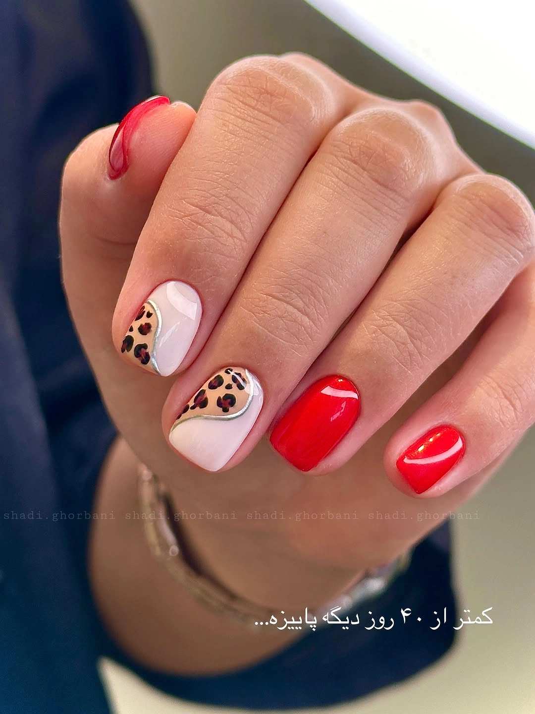 white red short square nails with leopard accent