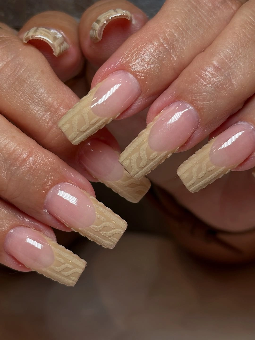 cream textured long nude nails