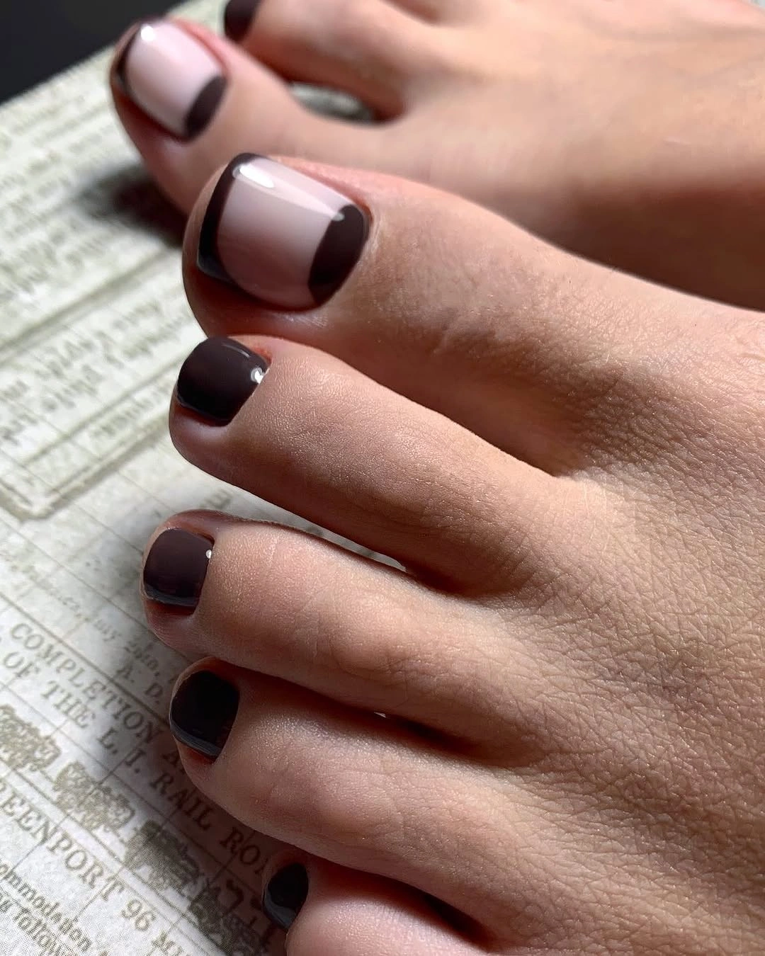 Dark brown block pedicure with nude space