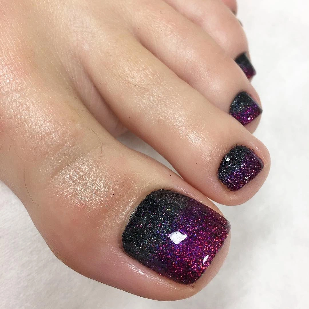 Black and purple glitter fade pedicure