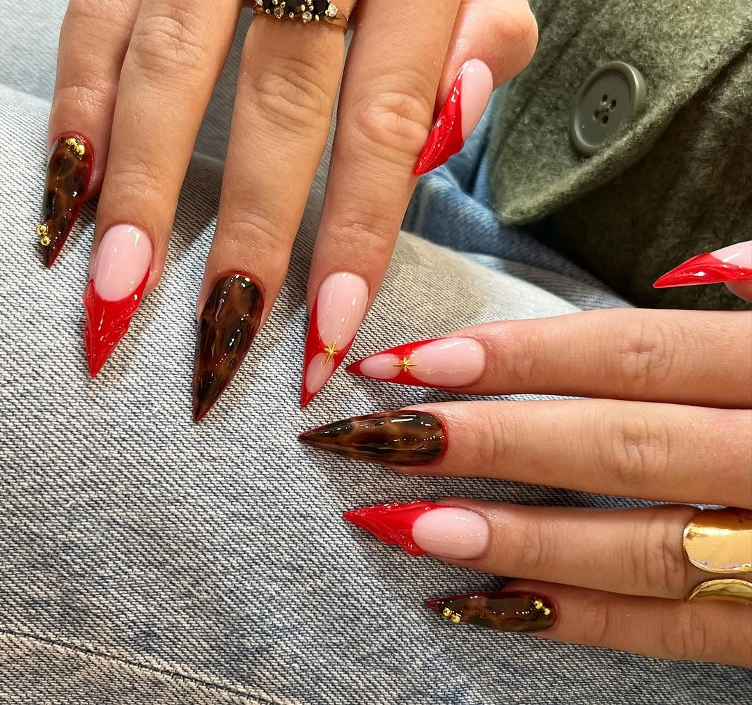 Red tip nails with brown tortoise accents