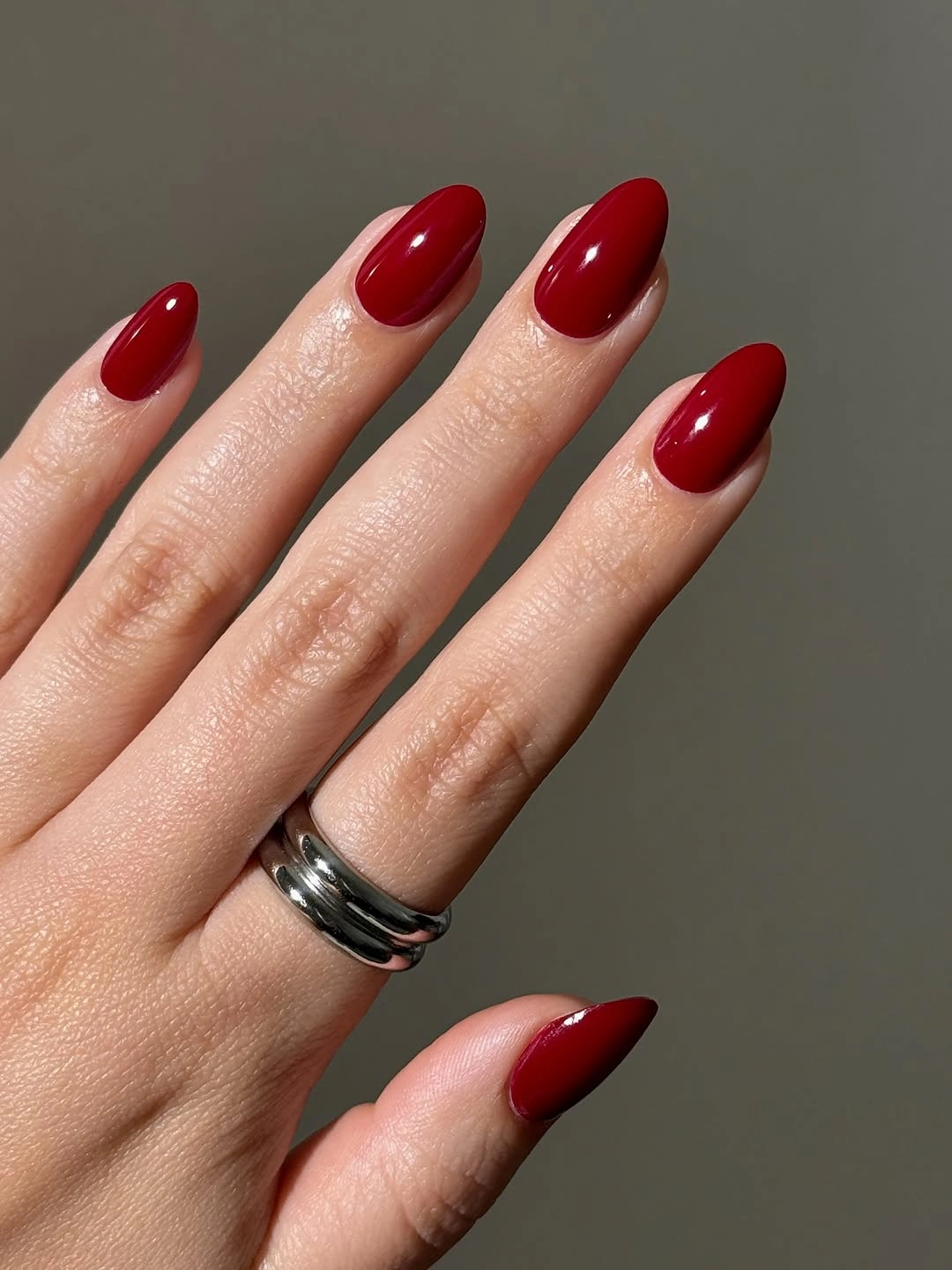 Deep cherry red medium oval nails