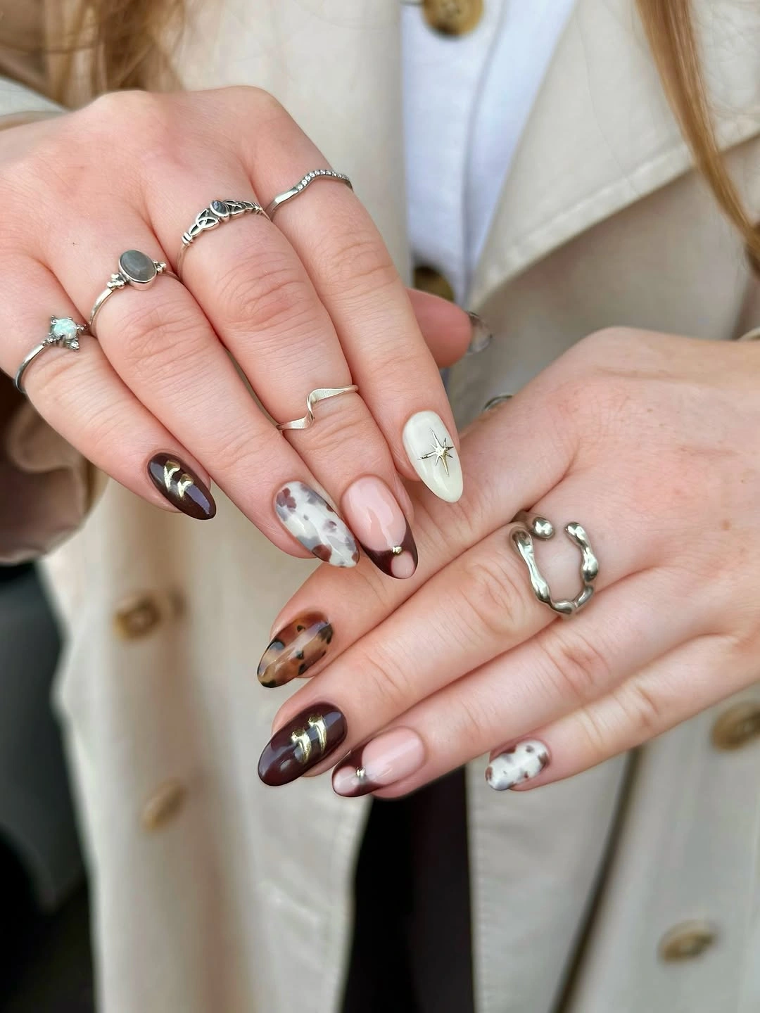 Medium almond pale pink white brown and red nails with mixed details