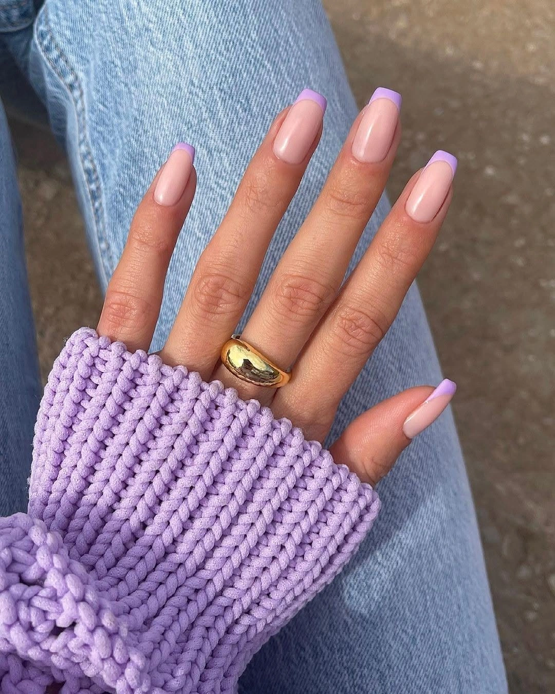glossy blush pink medium short coffin nails in a solid color