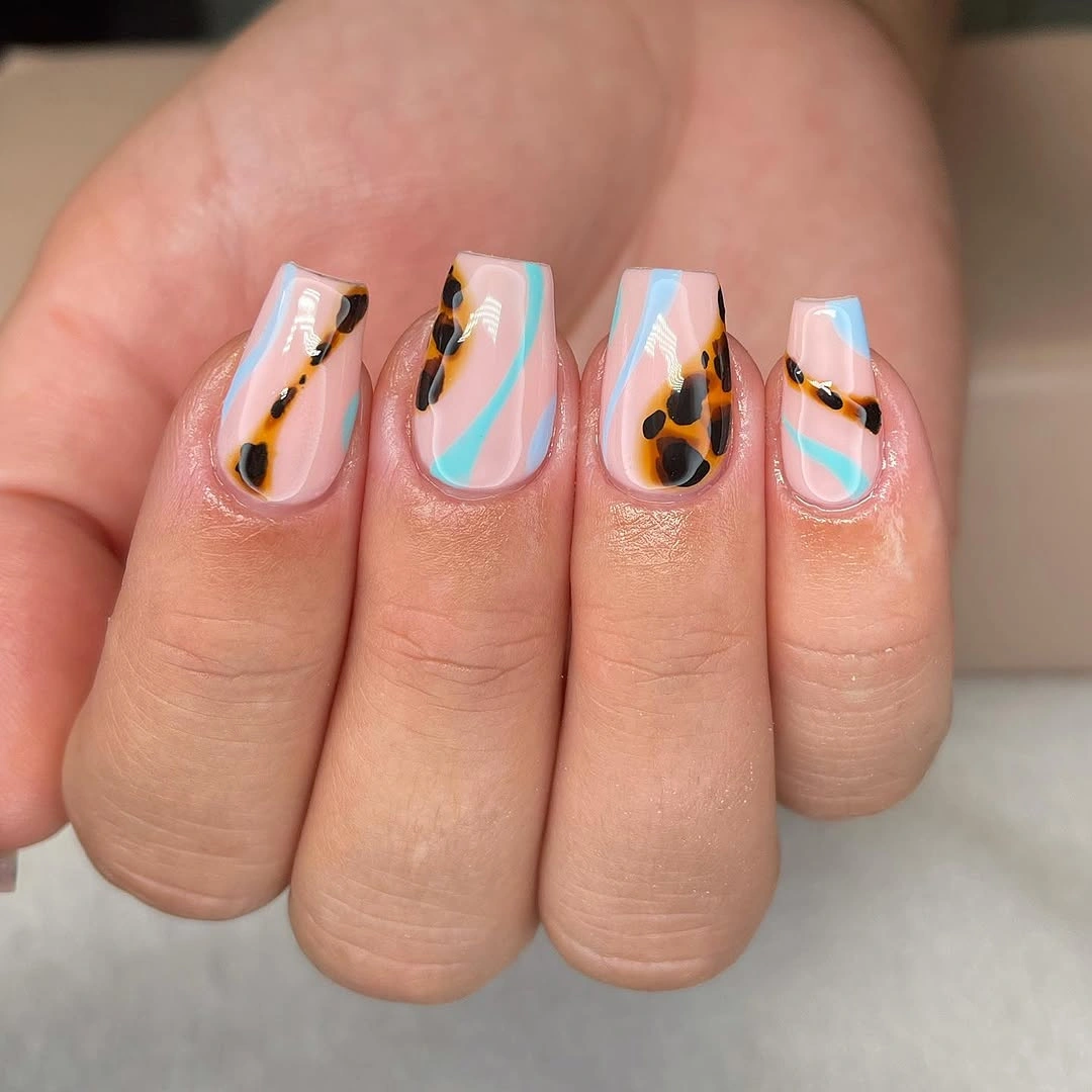 short peach coffin nails with teal coral and black abstract lines