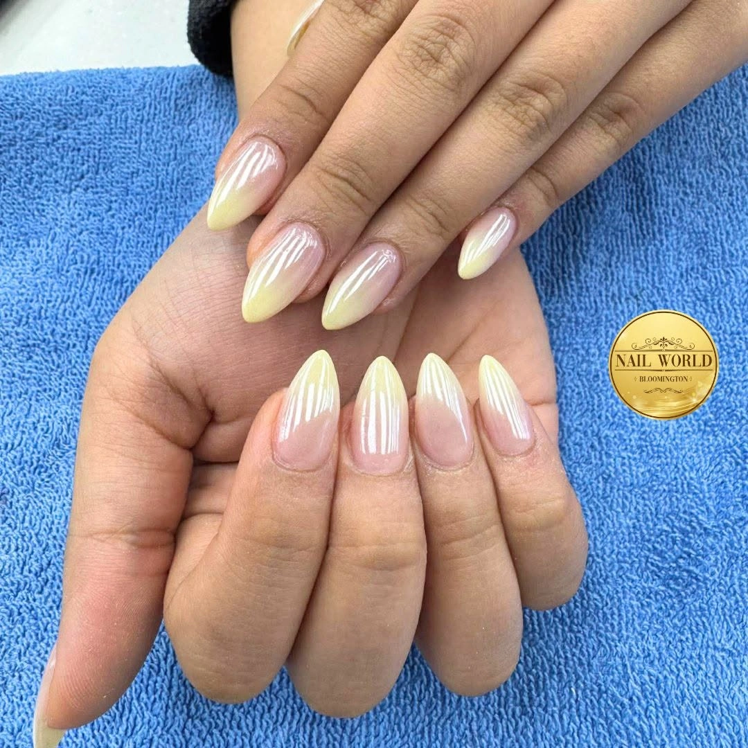 Short almond nails with soft yellow ombre tips