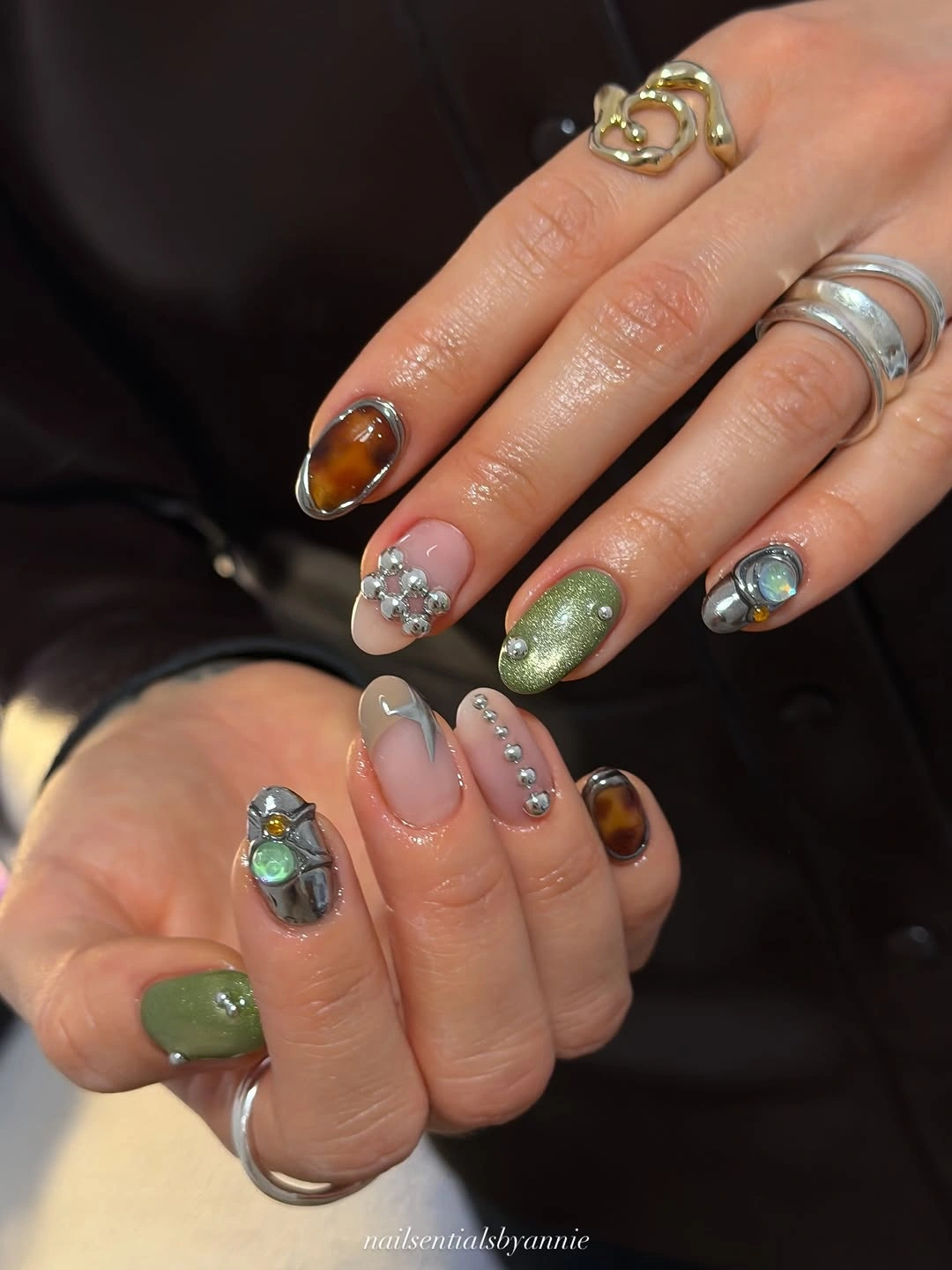 Olive and amber short nails with silver accents