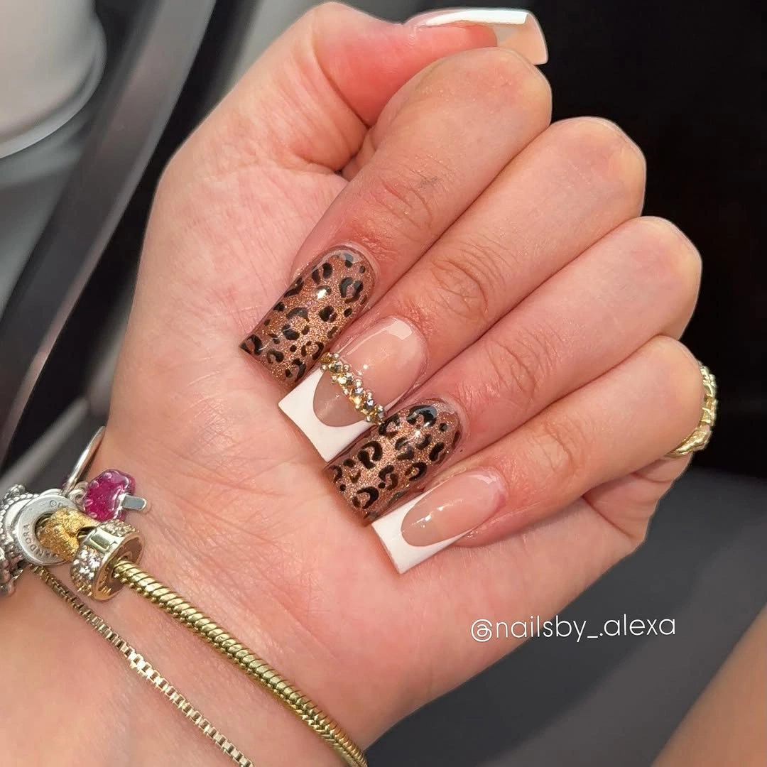 Nude square nails with leopard zebra and checker pattern accents