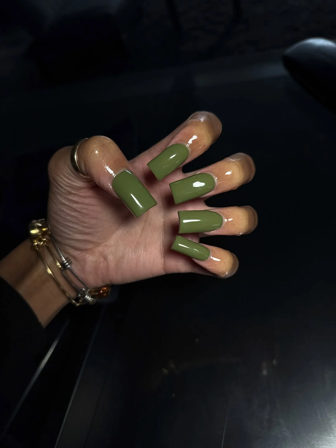 Nude square nails with muted olive green squared French tip blocks