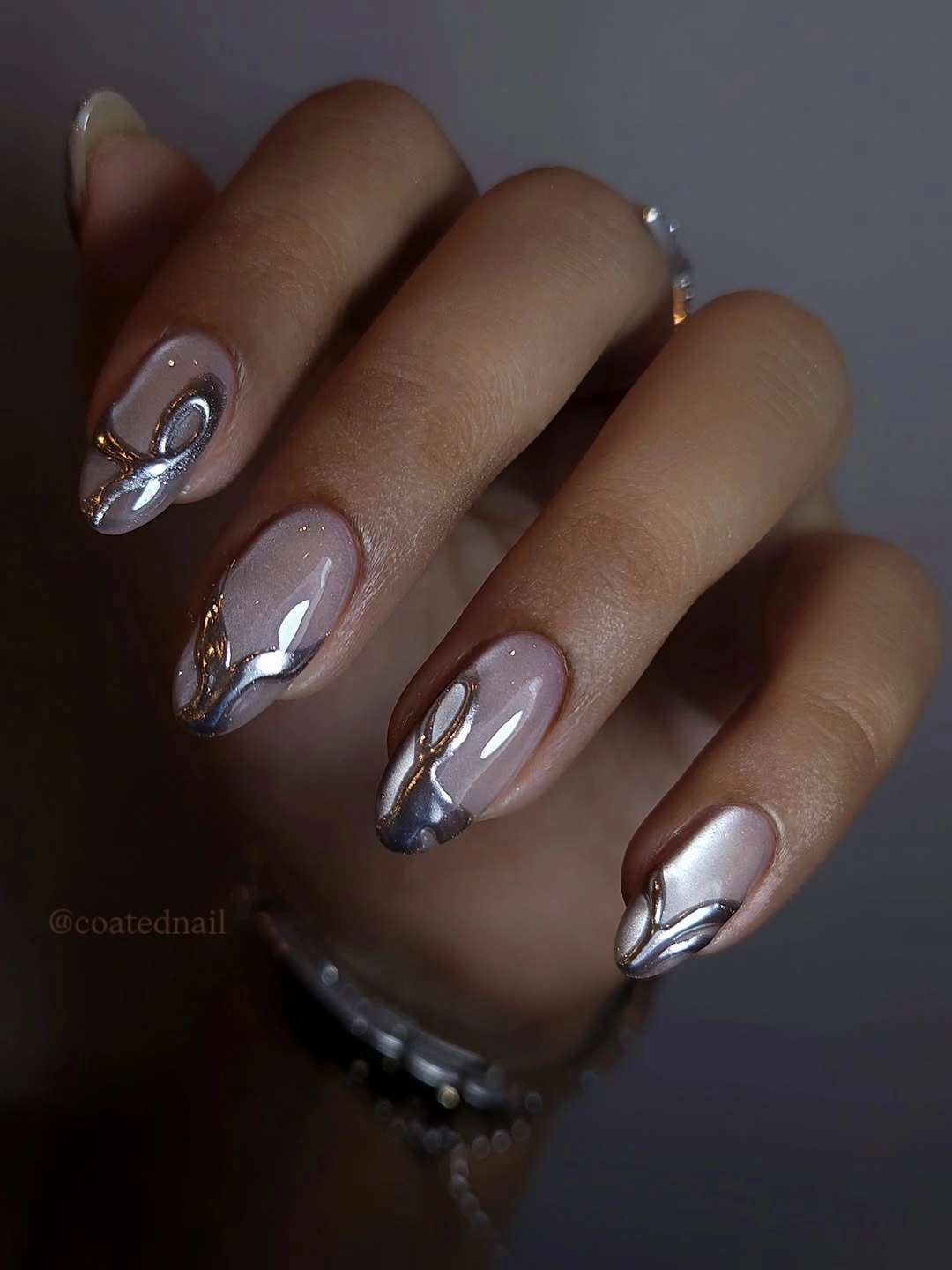 Medium almond nails with bright yellow French tips over a sheer pink base