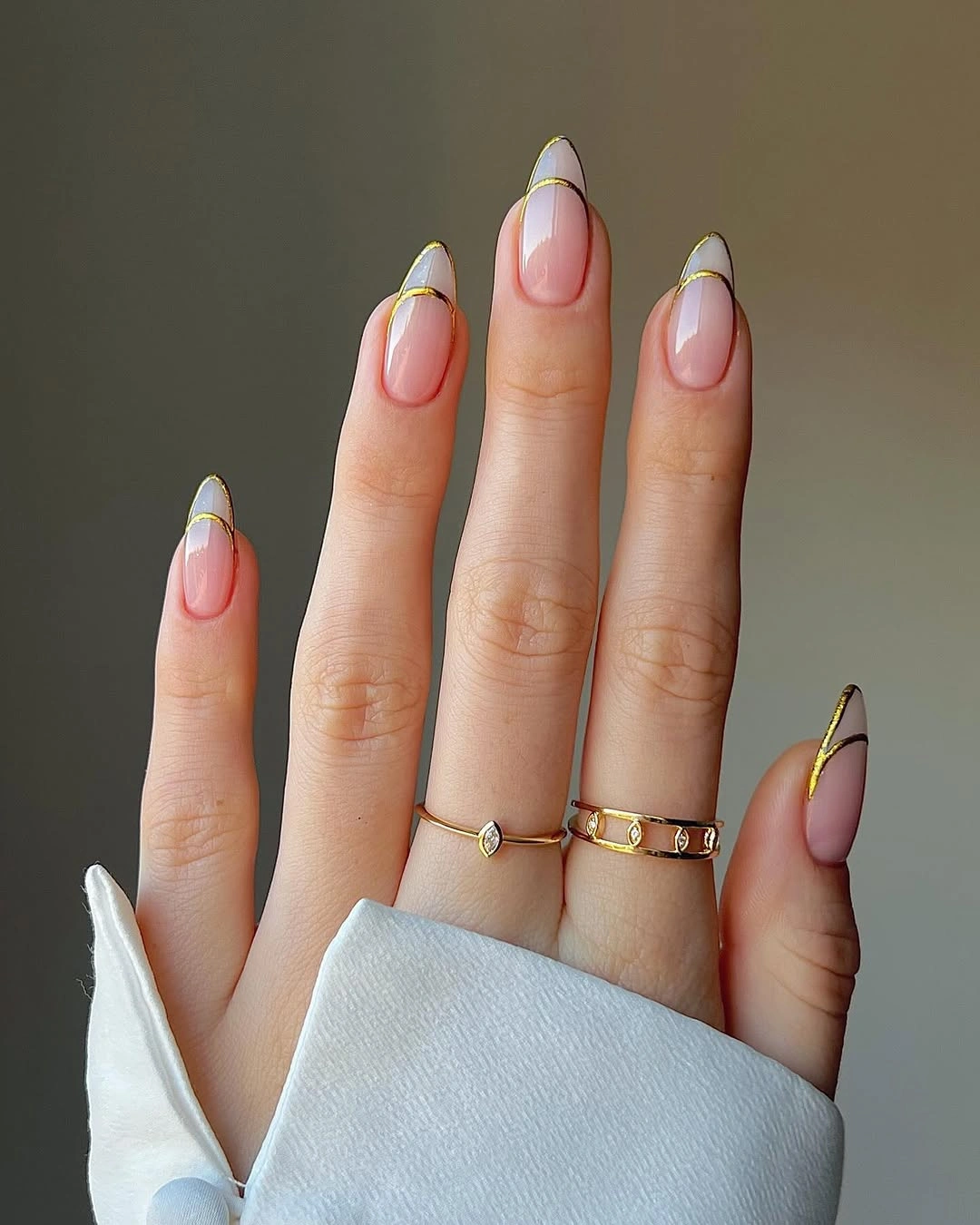 Long pale coffin wedding nails with delicate gold-edged French tips