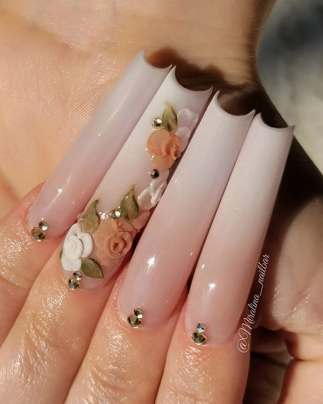 Long milky pink coffin wedding nails with raised flowers and gold studs