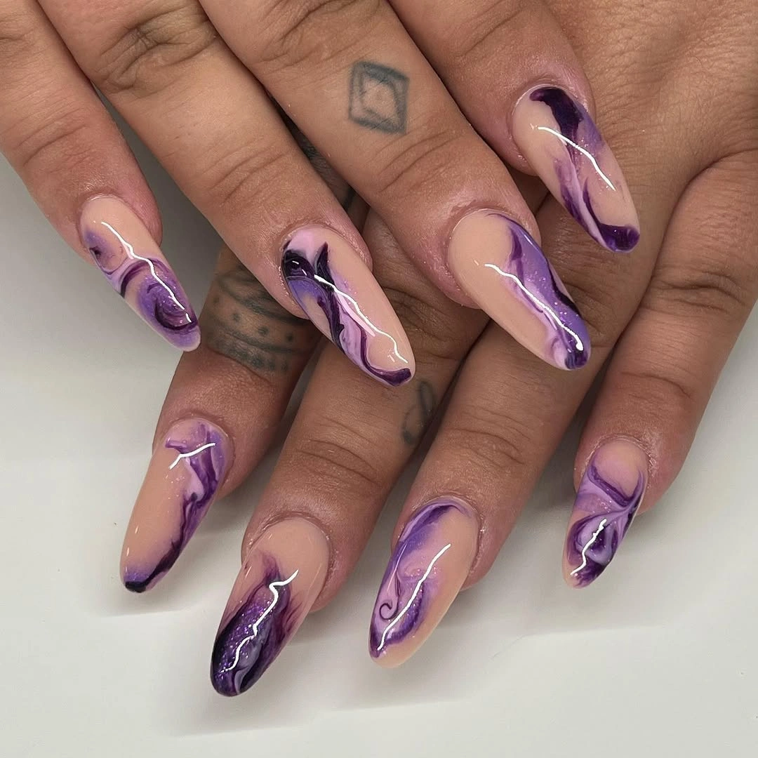 Long lilac stiletto wedding nails with white wavy line details