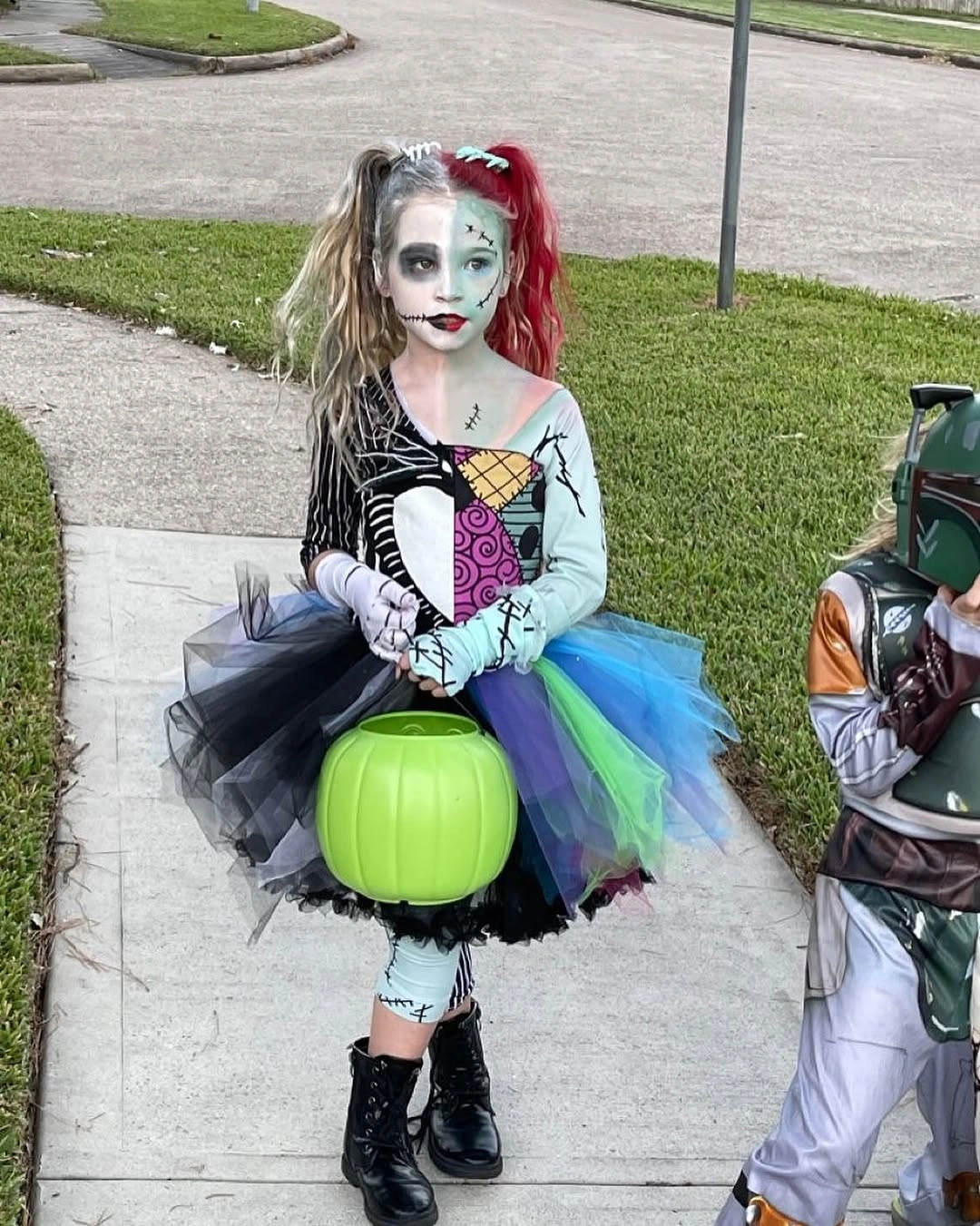 Sally from The Nightmare Before Christmas child costume with patchwork top blue-purple skirt black tulle and green pumpkin bucket