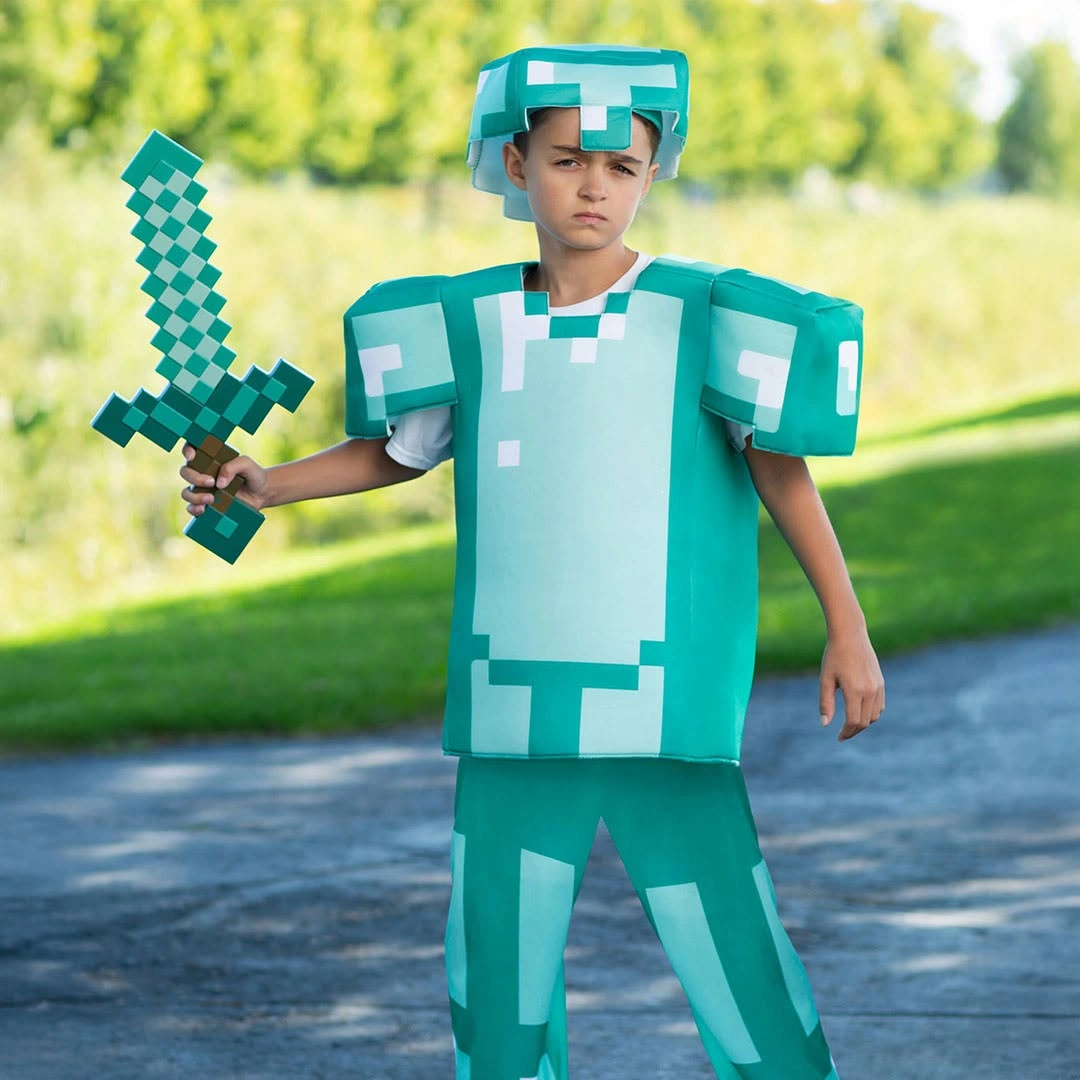 Child dressed in Minecraft diamond armor costume with turquoise block helmet armor trousers and pixel sword