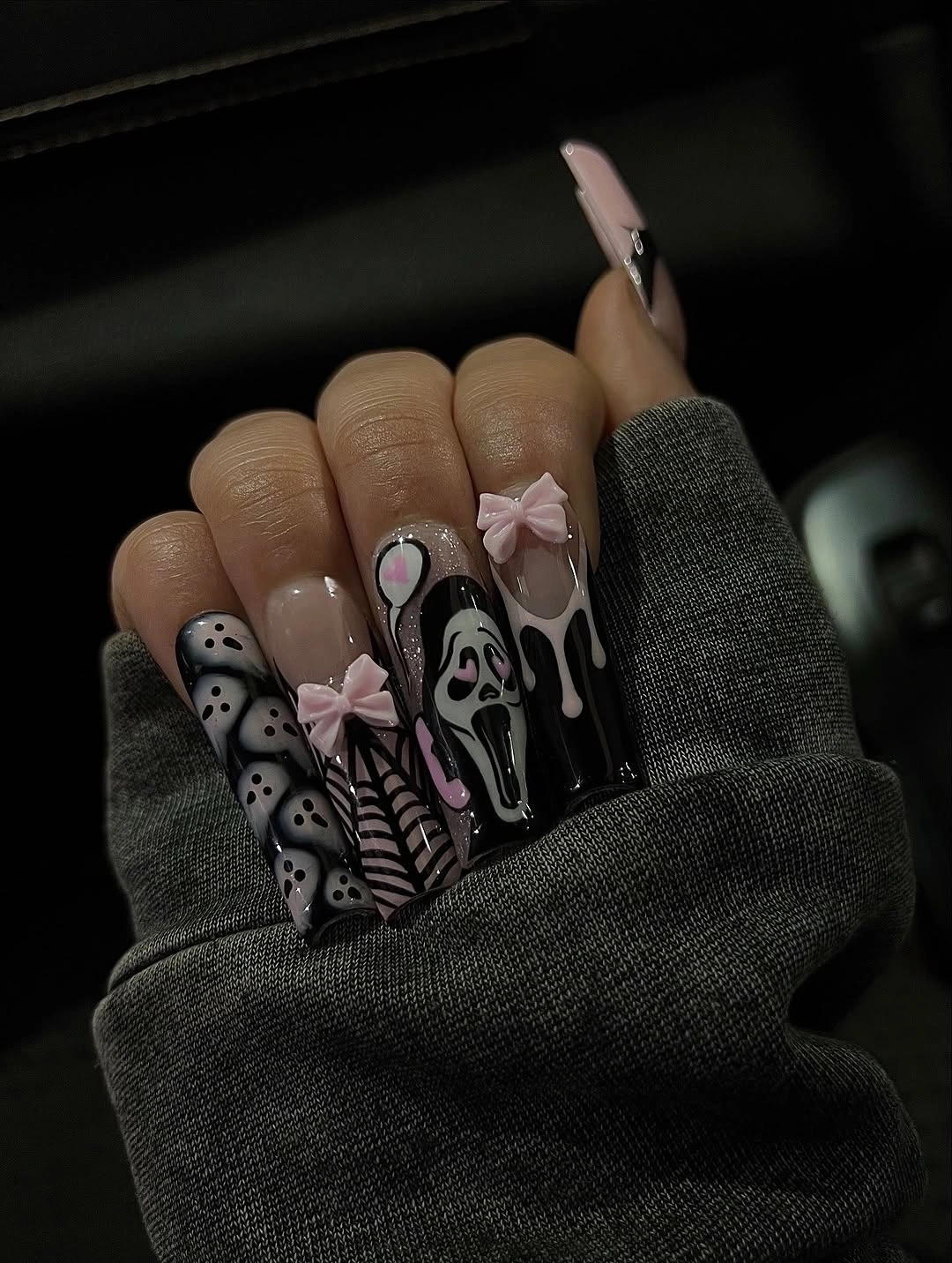 Long square gray nude nails with ghosts and spooky illustrated details