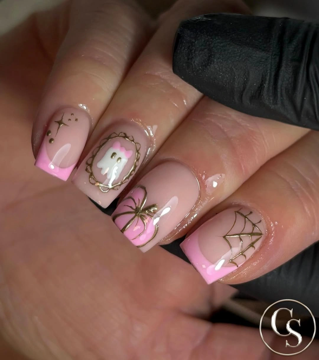 Short square pink French nails with delicate web details