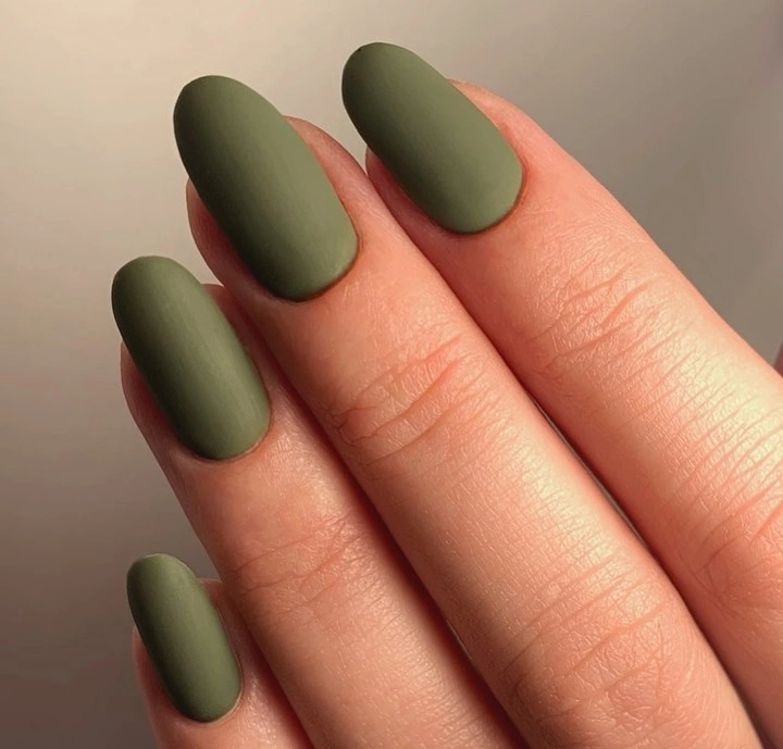 Short rounded square nails in a deep matte olive green