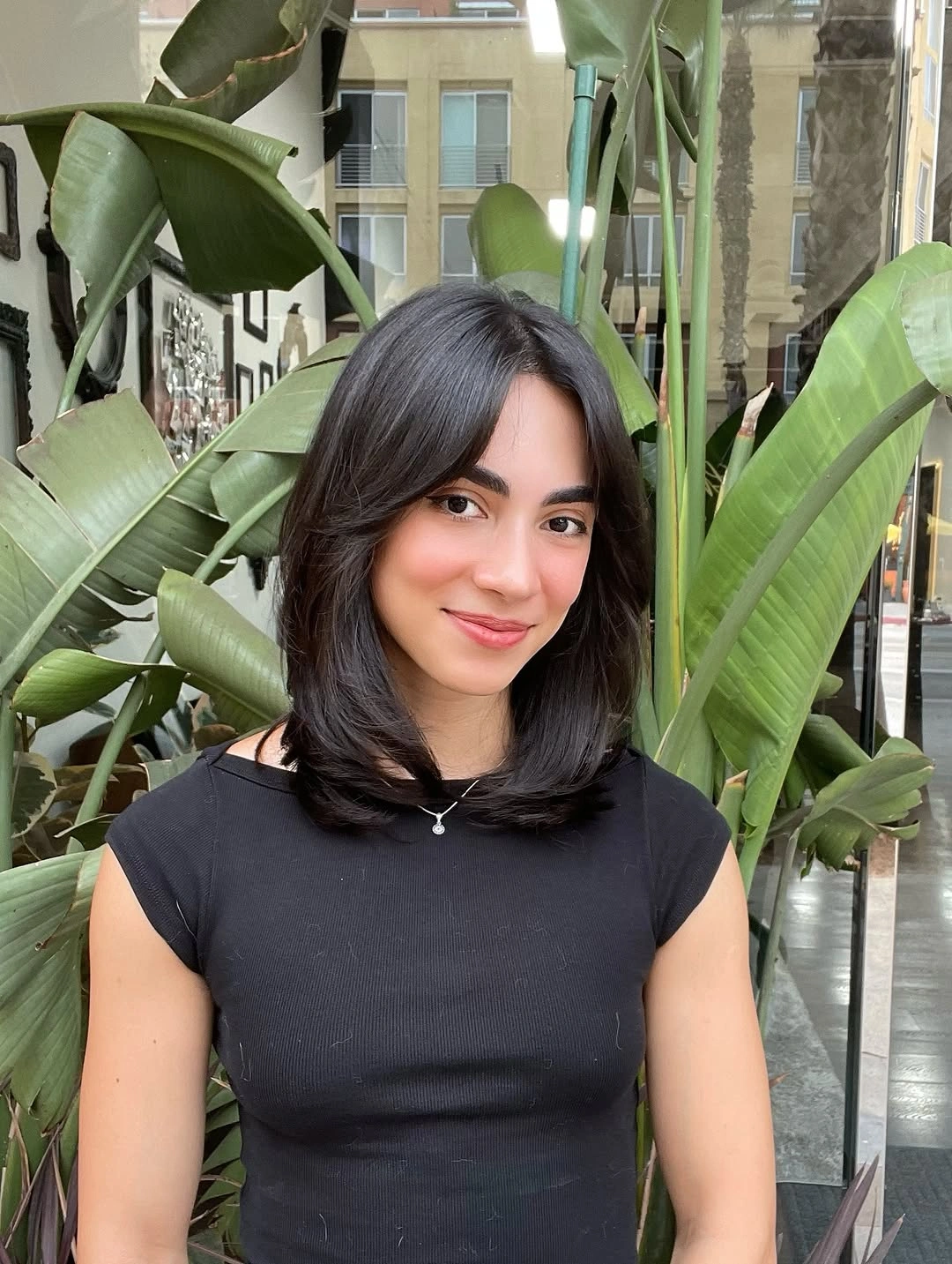 short dark layered bob with flipped ends