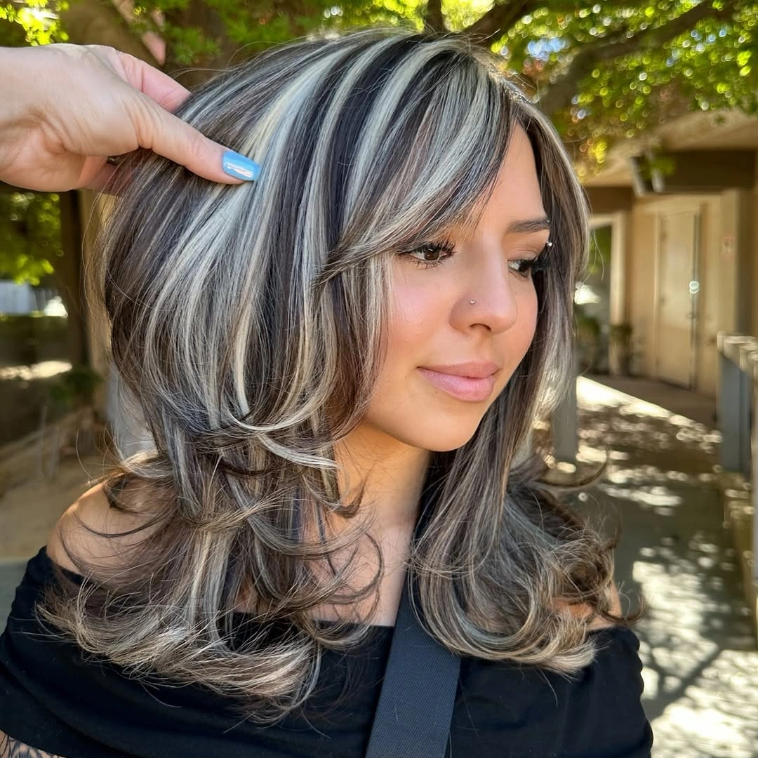 long cool blonde hair with bright layered streaks