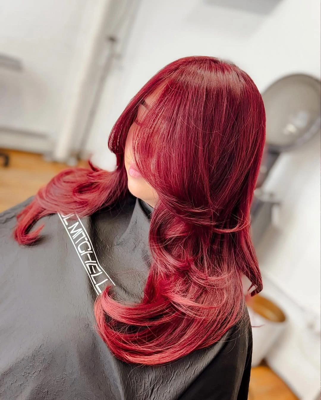 long red waves with part of the hair gathered back