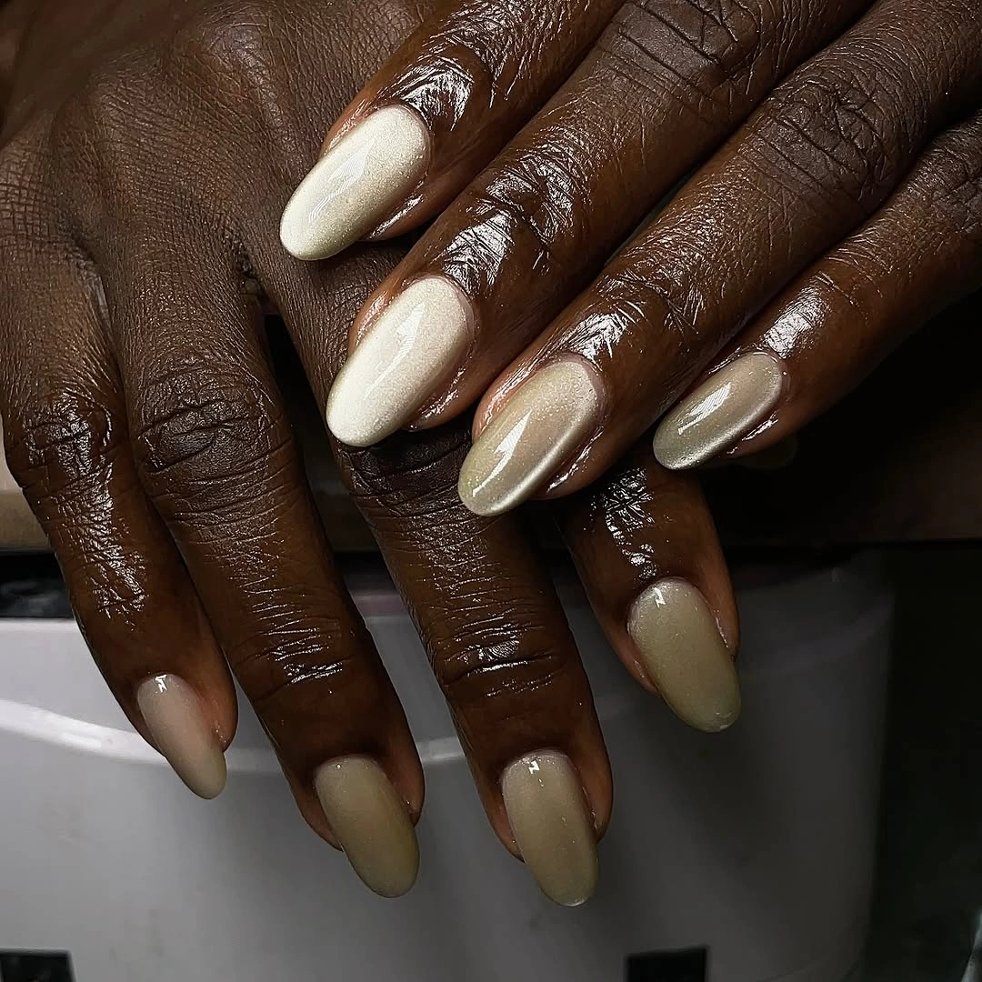 Almond nails in champagne beige and pearl neutral shades