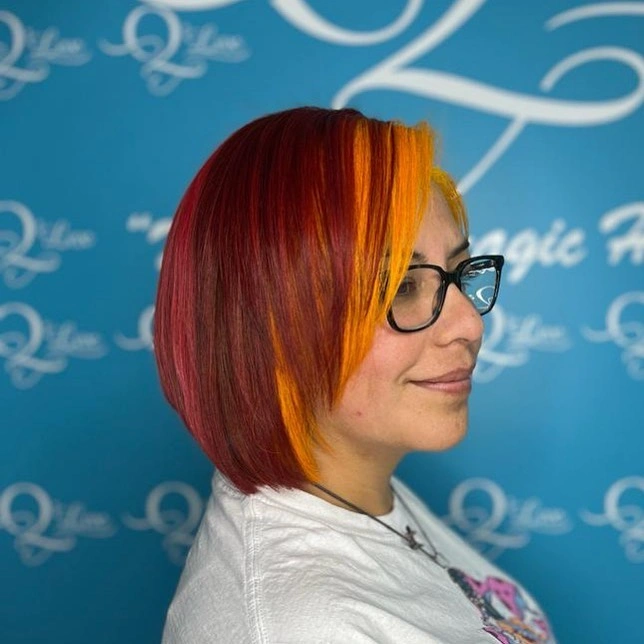 Rounded short red bob with vivid orange front panel and side profile