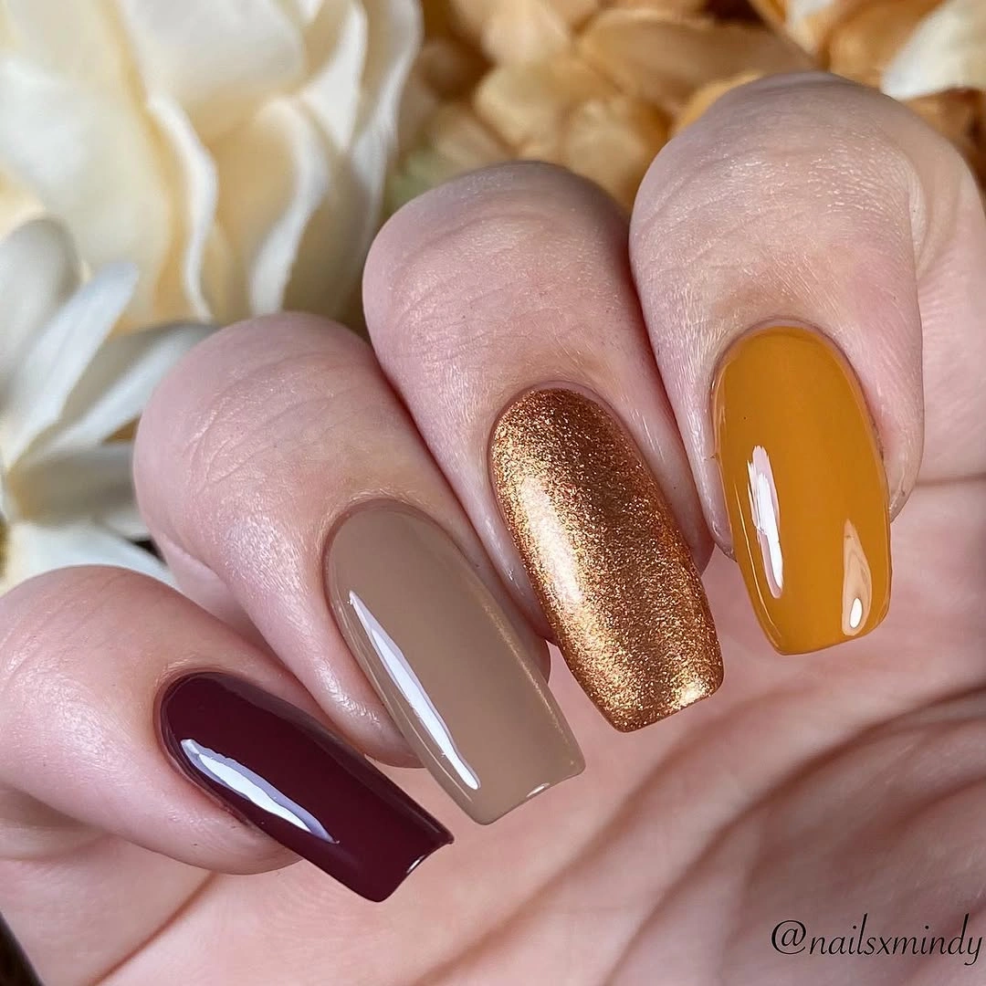 Short square nails in taupe copper glitter mustard yellow and burgundy