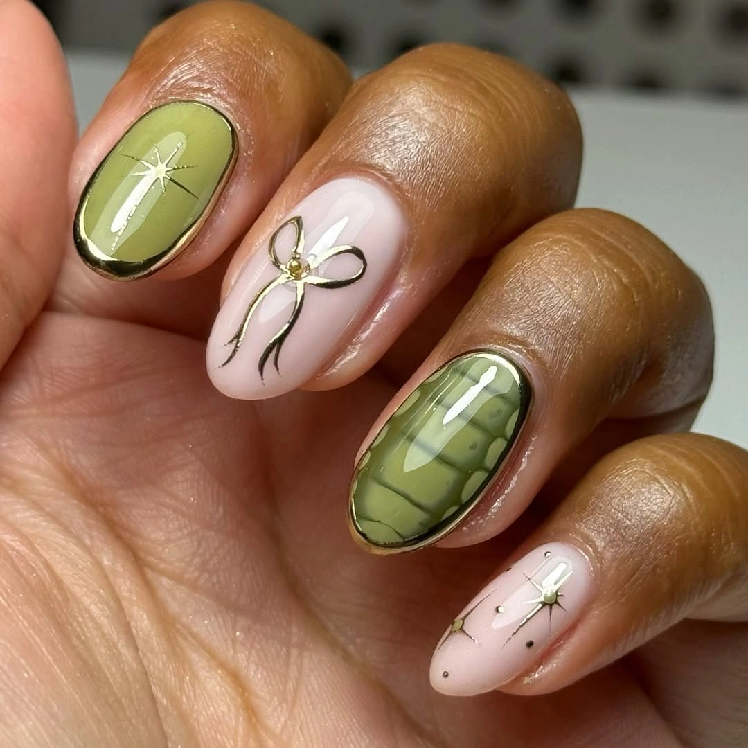 Olive and pale pink nails with fine botanical floral linework