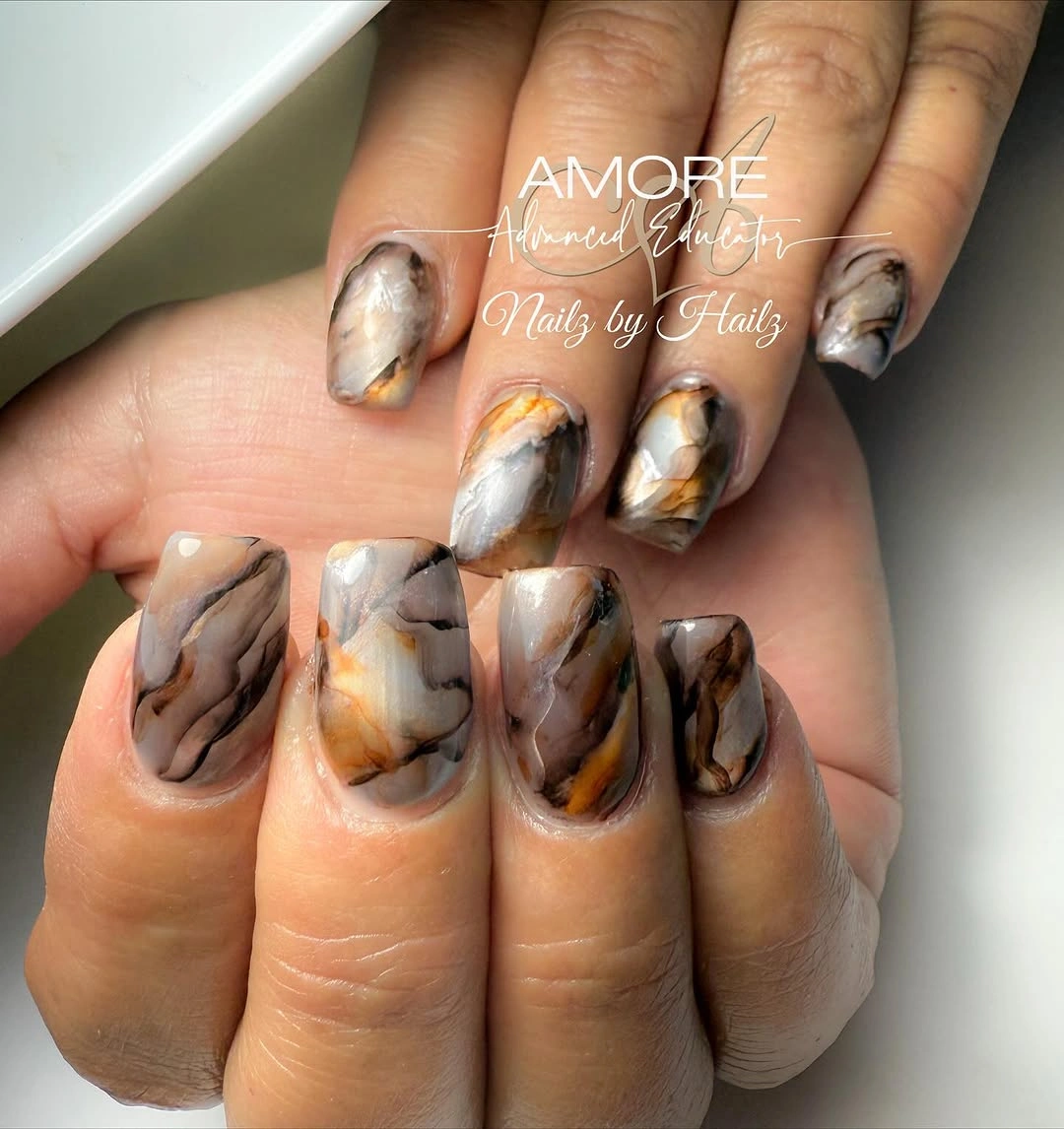Medium square nails with smoky brown gray and amber marble swirls