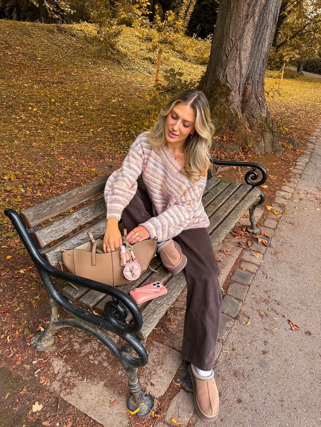 Pink checked cropped cardigan with dark brown trousers and tan flats