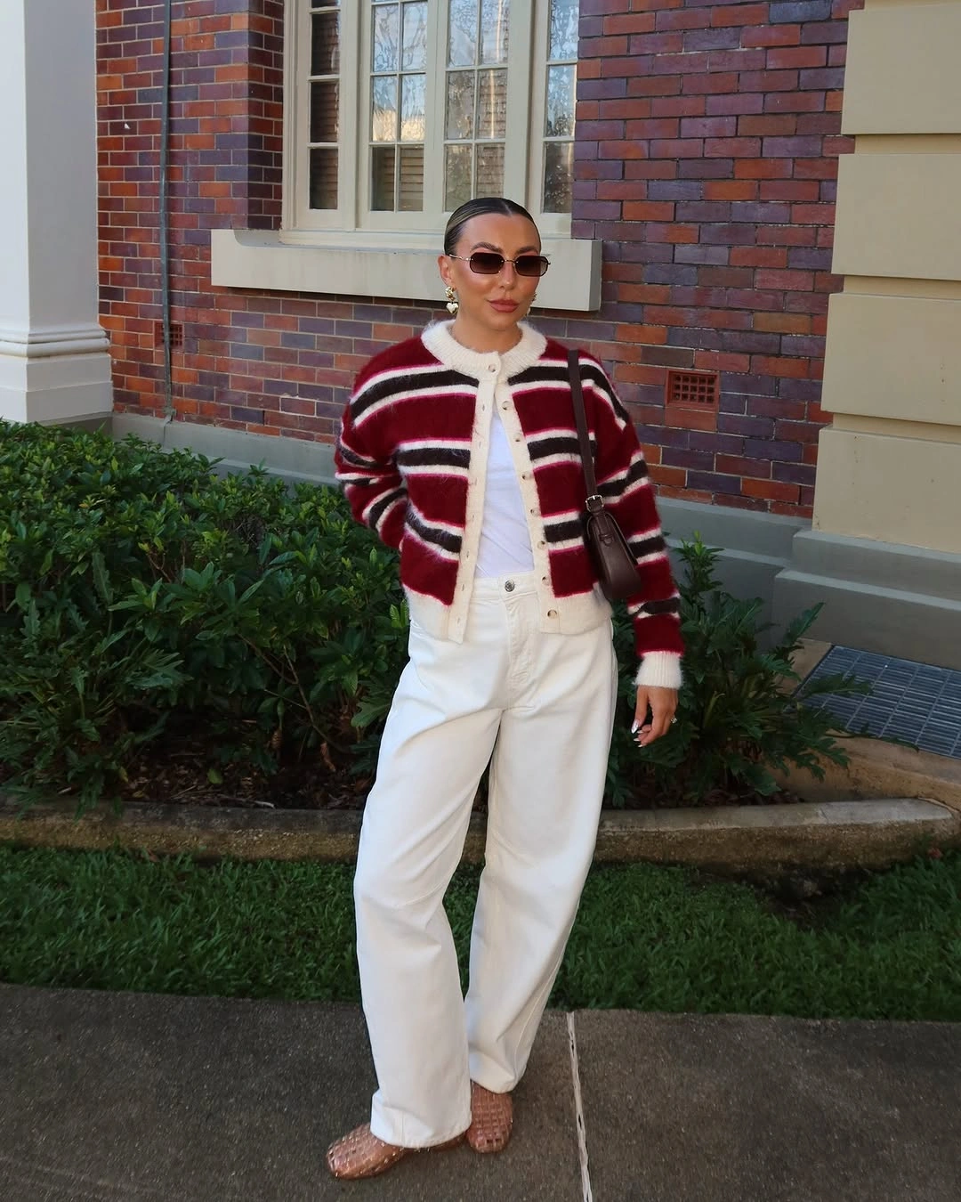 Red cream striped cardigan with ivory wide-leg jeans