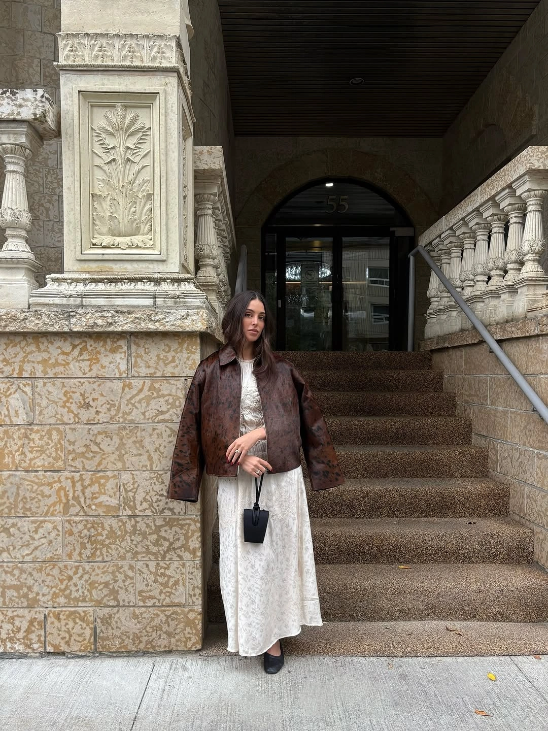 Brown jacket with white textured maxi skirt