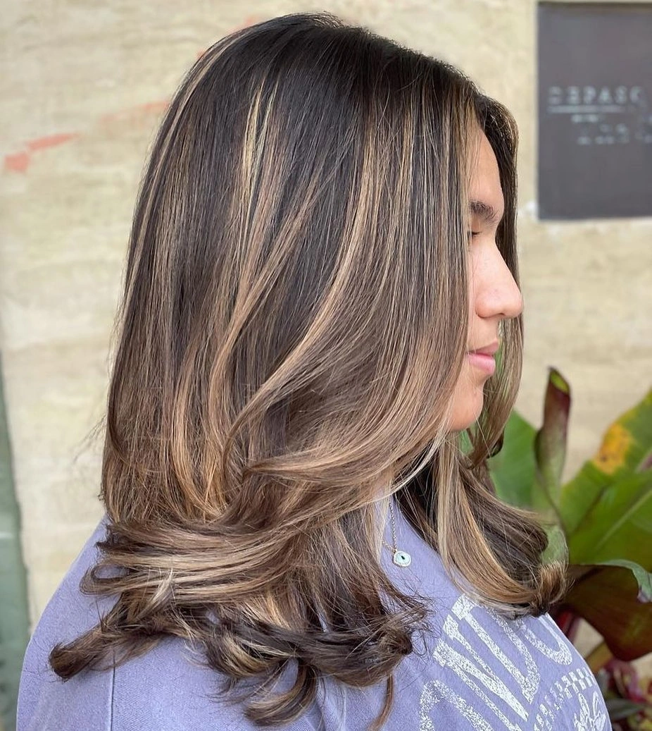 Taupe bronde waves with layered lighter ribbons